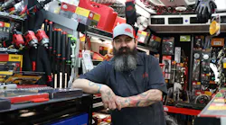 Cody Pick, a Mac Tools dealer, poses in his tool truck