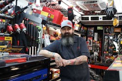 Cody Pick, a Mac Tools dealer, poses in his tool truck Cody Pick, a Mac Tools dealer, poses in his tool truck