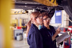 Female automotive technicians student and mentor Female automotive technicians student and mentor