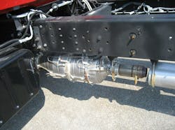 Full exhaust aftertreatment system mounted to the bottom of the chassis rail on an Isuzu 7500. Full exhaust aftertreatment system mounted to the bottom of the chassis rail on an Isuzu 7500.