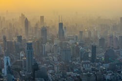 Figure 2- Derived from a combination of tailpipe emissions and sunlight, Photochemical Smog, seen here as a hazy cloud, is a dangerous substance and a major factor in the development of the Clean Air Act. Figure 2- Derived from a combination of tailpipe emissions and sunlight, Photochemical Smog, seen here as a hazy cloud, is a dangerous substance and a major factor in the development of the Clean Air Act.