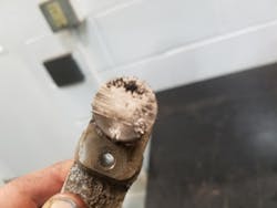 Figure 7- This speed/position sensor is damaged as it has come into contact with the rotating components internal to the drive motor. Replacement of the motor assembly is the proper fix for this vehicle. Figure 7- This speed/position sensor is damaged as it has come into contact with the rotating components internal to the drive motor. Replacement of the motor assembly is the proper fix for this vehicle.