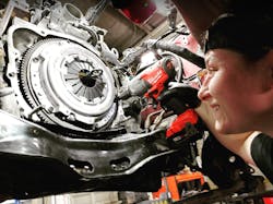 Here, Dannielle Vaclavik, of Larin Automotive (in Norwood, Massachusetts), is seen performing a clutch assembly replacement.