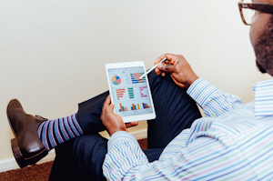 man looking at survey results