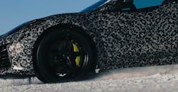 In this closeup of a screenshot from General Motors&apos; YouTube video, snow sprays from front-wheel wheelspin.