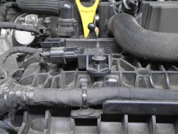 Figure 4- The MAP sensor hold-down screw was backed out far enough to cause the check engine light to illuminate soon. Figure 4- The MAP sensor hold-down screw was backed out far enough to cause the check engine light to illuminate soon.