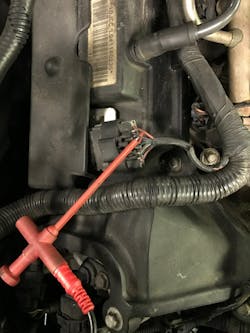 Figure 4- Using a scope lead and piercing probe to test for available voltage. NOTE: Be sure to seal the wire insulation after testing if piercing probes are utilized. Figure 4- Using a scope lead and piercing probe to test for available voltage. NOTE: Be sure to seal the wire insulation after testing if piercing probes are utilized.