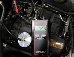 Figure 15 - Crankcase pressure test on 2011 BMW 335xi with code 28A0. Reading is equal to 17 mb, too much pressure in crankcase meaning a leak is present. Figure 15 - Crankcase pressure test on 2011 BMW 335xi with code 28A0. Reading is equal to 17 mb, too much pressure in crankcase meaning a leak is present.
