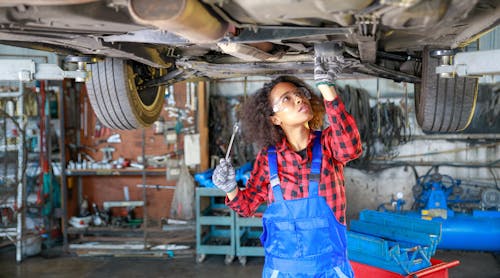 young female auto technician
