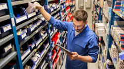 Counterman Or Warehouse Worker Pulling Parts From Shelf Dreamstime M 78423972
