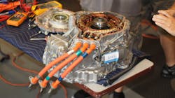 An electric motor from a Toyota Prius. The Prius has two electric motor/generators and a gasoline engine. An electric motor from a Toyota Prius. The Prius has two electric motor/generators and a gasoline engine.