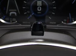 Figure 1- GM Super Cruise steering column-mounted camera ensures the hands-free driver is not also 'attention' free! Close your eyes or look away for more than a few seconds and 'beep, beep' beep.' Figure 1- GM Super Cruise steering column-mounted camera ensures the hands-free driver is not also 'attention' free! Close your eyes or look away for more than a few seconds and 'beep, beep' beep.'