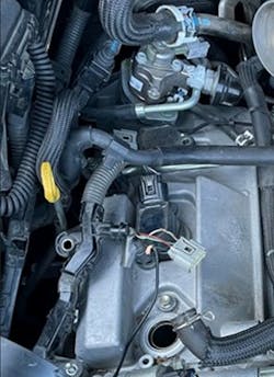 Figure 4- While locating an easy point of access for measurable coil readings, I found a non-OEM modification to two wires on Ignition Coil 1. These two wires were for coil power supply and coil round supply. Figure 4- While locating an easy point of access for measurable coil readings, I found a non-OEM modification to two wires on Ignition Coil 1. These two wires were for coil power supply and coil round supply.