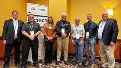 Architecture Committee members are pictured at the 2022 CIECA CONNEX Conference in St. Charles, Mo. From l.: CIECA Past Chair Jeff Schroder, Car-Part.com; Andy Bober, Entegral; Paulette Reed, CIECA&apos;s technical project manager; Mike Hastings, Car-Part.com; Architecture Committee Chair Dan Webster, Enlyte; CIECA Chair Phil Martinez, Mitchell International; and Paul Barry, CIECA&apos;s executive director.