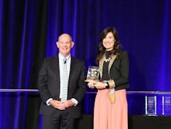 Auto Care Association President and CEO Bill Hanvey (left) with 2022 Impact Award Winner Elle Lawhead (right).
