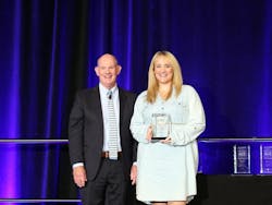 Auto Care Association President and CEO Bill Hanvey (left) with 2022 Impact Award Winner Meagan Moody (right).