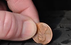 Figure 1- The distance to between the top of the penny and Abe&apos;s head is approximately 2/32&apos;. If the penny is placed within tread (as displayed in the picture) and Abe&apos;s head is visible, the tread is too low for safe operation and the tire should be replaced.