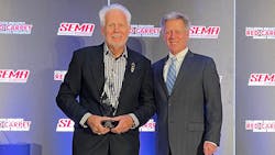 Bill Eveland, on behalf of Eveland Brothers Collision Repair, Inc., accepts the Russ Verona Memorial Award from John Van Alstyne, I-CAR CEO and president. Bill Eveland, on behalf of Eveland Brothers Collision Repair, Inc., accepts the Russ Verona Memorial Award from John Van Alstyne, I-CAR CEO and president.
