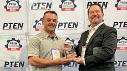 Austin Matney (left) accepting the 2022 Best Young Tech Award from Motor Age Managing Editor Jay Sicht (right).