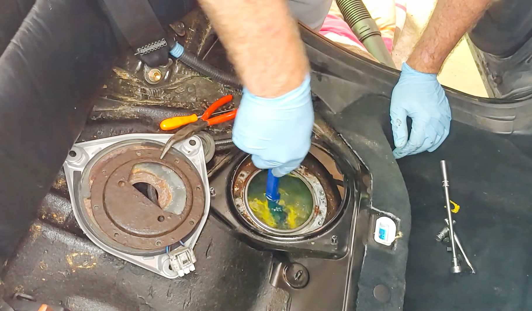 Figure 1-Although this tank appears to be clean from this view, the entire tank must be clean. Delphi Technologies' Fuel Tank Cleaning Tool, No. FC02, is designed to clean a hard-to-drop fuel tank before installing a new pump module.