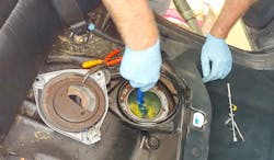 Figure 1-Although this tank appears to be clean from this view, the entire tank must be clean. Delphi Technologies' Fuel Tank Cleaning Tool, No. FC02, is designed to clean a hard-to-drop fuel tank before installing a new pump module. Figure 1-Although this tank appears to be clean from this view, the entire tank must be clean. Delphi Technologies' Fuel Tank Cleaning Tool, No. FC02, is designed to clean a hard-to-drop fuel tank before installing a new pump module.