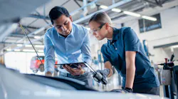 Young man manager and young woman technician