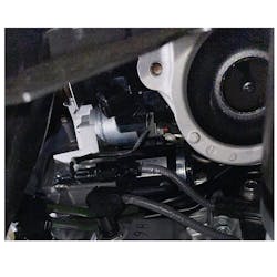 Figure 7- Starter motor located on the passenger side of the engine, hidden under the exhaust manifold