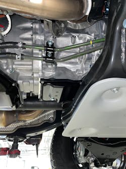 Figure 2- The front module assembly located in front of the transmission Figure 2- The front module assembly located in front of the transmission