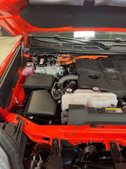 Figure 6- Hybrid inverter located on the passenger side of the engine compartment along the firewall Figure 6- Hybrid inverter located on the passenger side of the engine compartment along the firewall