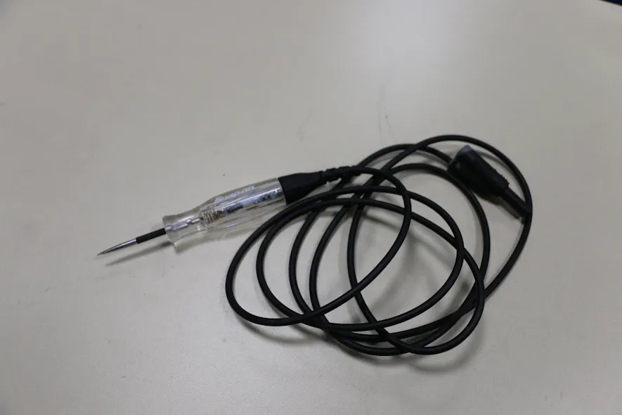 Figure 7- A test light, when referenced to ground, can provide illumination that helps us infer voltage available and variations of output illumination indicating the sensor is generating a signal.