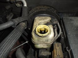 Figure 1- Brake fluid that has absorbed water becomes dark and murky. It should be changed before it damages hydraulic brake components. Figure 1- Brake fluid that has absorbed water becomes dark and murky. It should be changed before it damages hydraulic brake components.