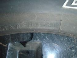 Figure 6- Build date stamped on the sidewall of a tire. This tire was manufactured during the 27th week of 2021. Figure 6- Build date stamped on the sidewall of a tire. This tire was manufactured during the 27th week of 2021.