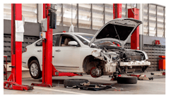 Collision-damaged car in dealership