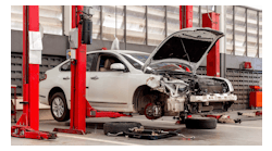 Collision-damaged car in dealership