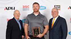 APH’s highest honor went to Mike Getz, who was named the 2022 Auto Value Store Manager of the Year. Presenting the award to Getz are John Bartlett, (left), chairman emeritus of APH, and Corey Bartlett, CEO of APH.