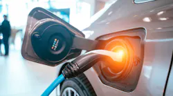 EV charging cable inserted in car's charging port