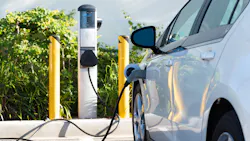 Electric Vehicle At Charging Station Electric Vehicle At Charging Station