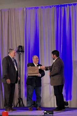 Previous ETI President Edward Prange handing off the gavel to the Current ETI President David Rich. Previous ETI President Edward Prange handing off the gavel to the Current ETI President David Rich.