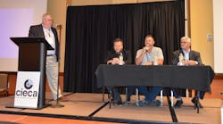 From Left, Moderator Paul Barry, CIECA executive director; Jake Rodenroth, Lucid Motors; Frank Phillips, Rivian; and Mark Allen, Audi of America; discuss &apos;EV Trends&apos; at the 2022 CONNEX in St. Charles, Missouri.