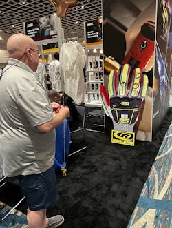 At the Ansell booth, attendees could play ring toss for a chance to get their names entered extra times in Ansell's raffle. At the Ansell booth, attendees could play ring toss for a chance to get their names entered extra times in Ansell's raffle.