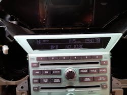 Figure 12- View of front HVAC module and controls with 5V reference restored (temp displays now active, driver and passenger front). Figure 12- View of front HVAC module and controls with 5V reference restored (temp displays now active, driver and passenger front).