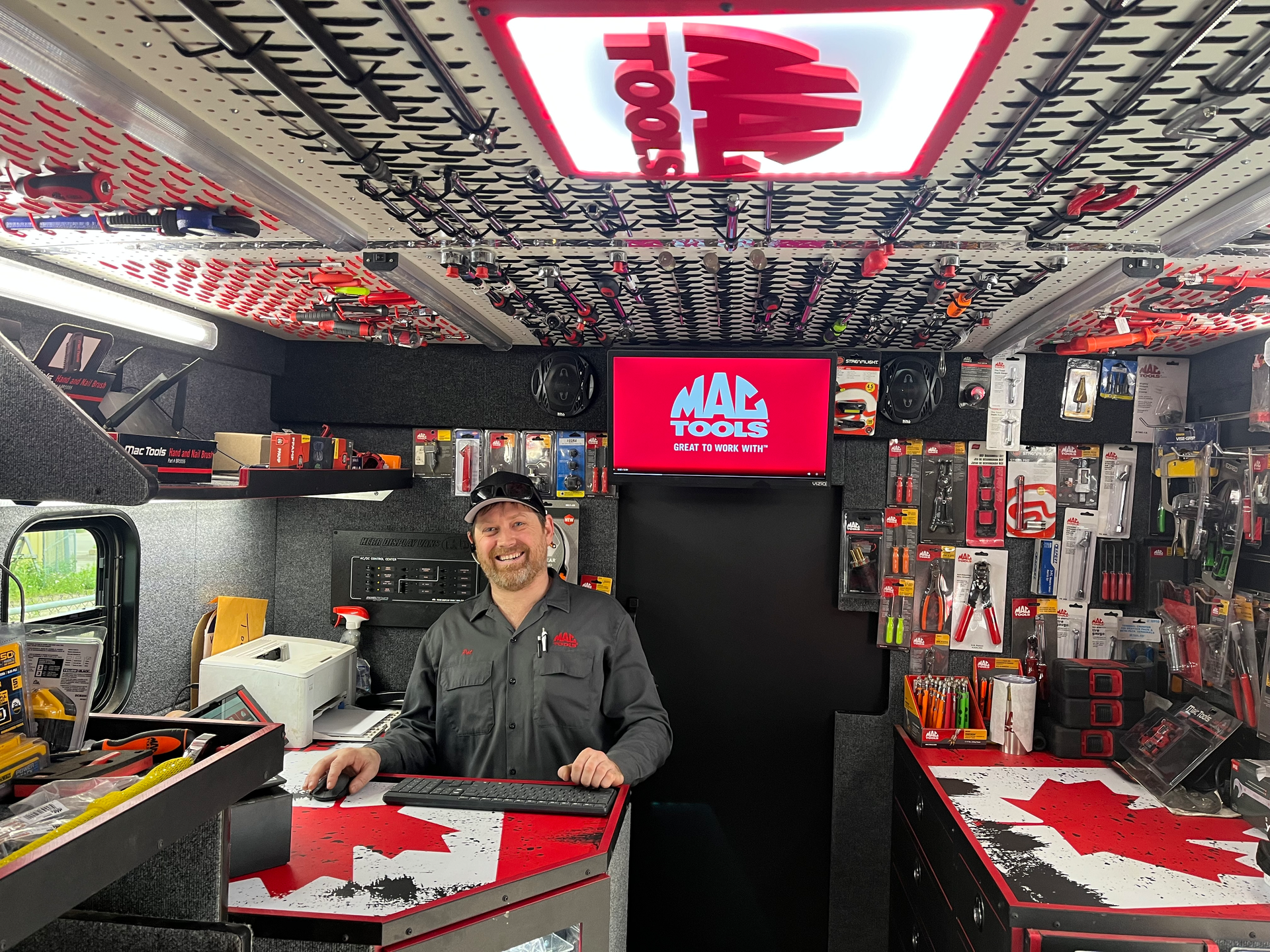 Burns' custom-wrapped desk features the Canadian flag.