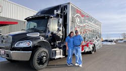 Bourdon and wife Monica in front of their truck. Bourdon and wife Monica in front of their truck.