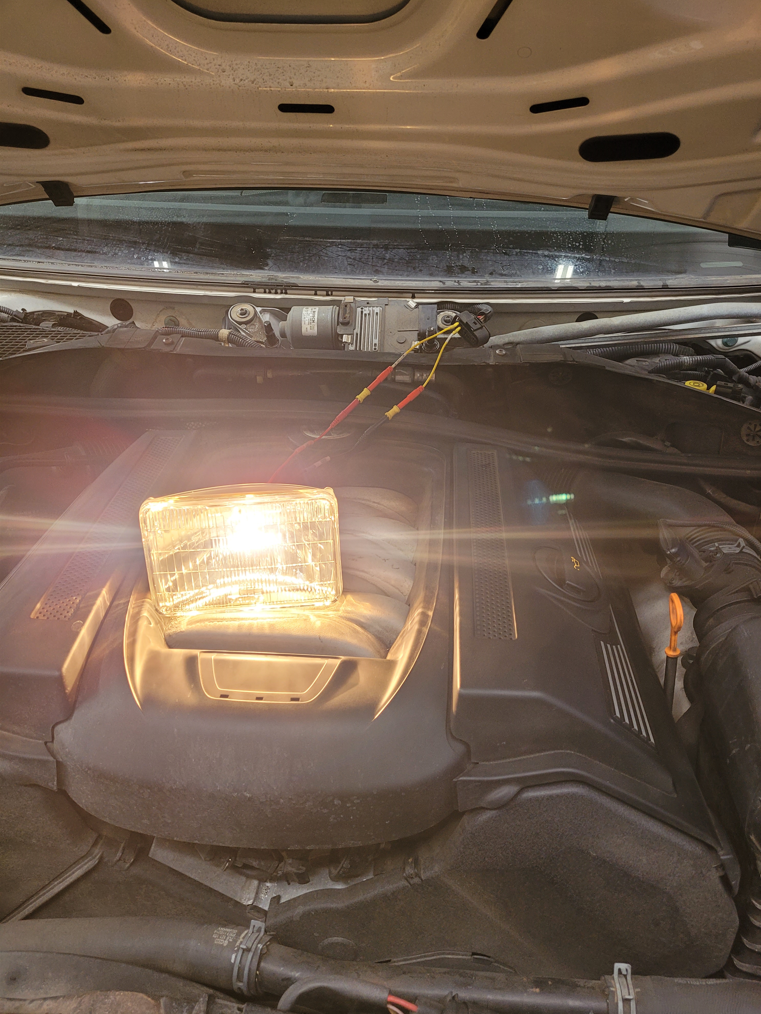 Figure 13- This sealed headlamp bulb provided the electrical load for the wiper motor circuit. Testing in this fashion loads the circuit dynamically and is a more accurate way of determining the health of the entire circuit prior to replacing a failed component.