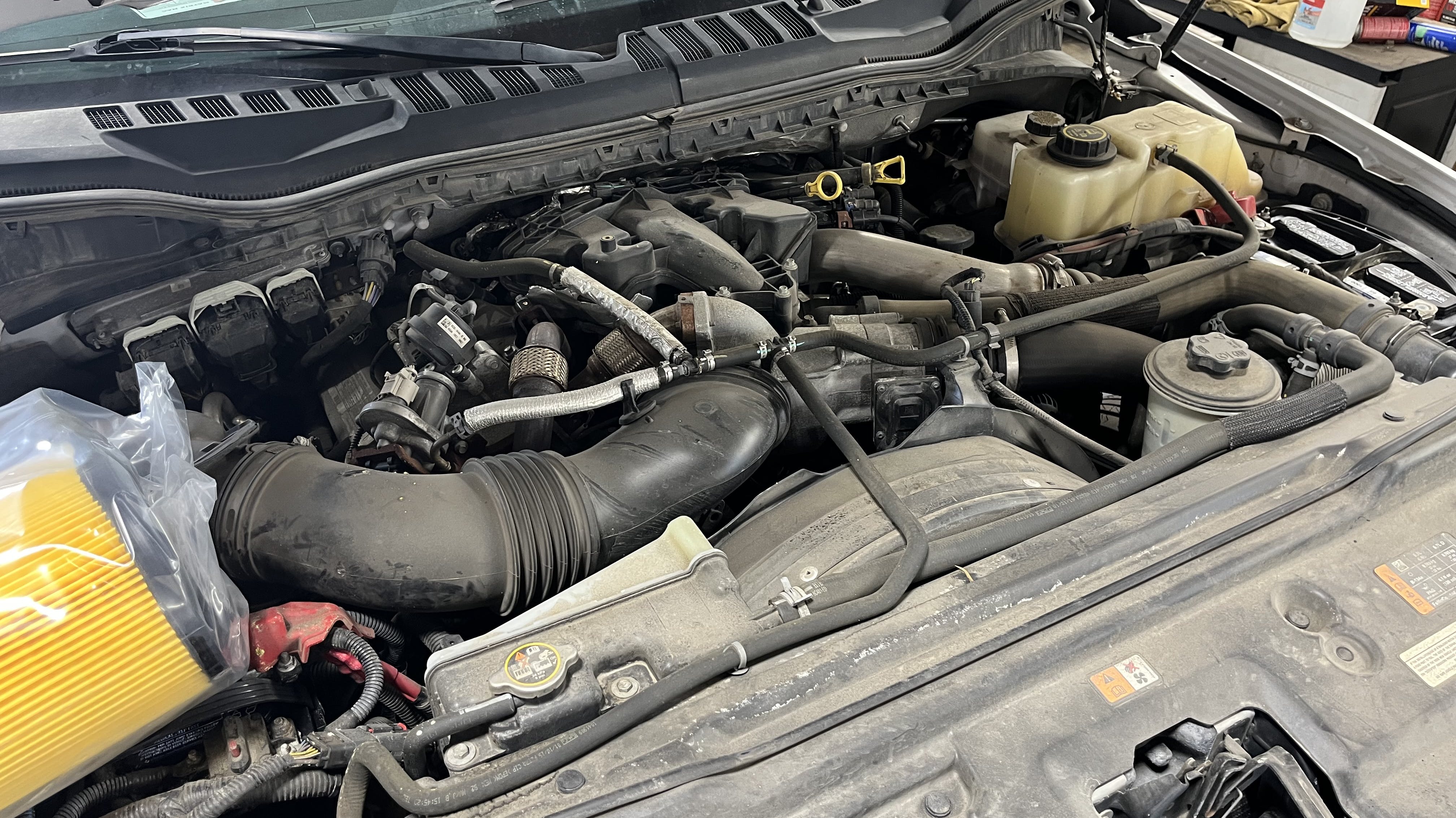 Figure 4 &mdash; Ford diesel engine and batteries &mdash; Showing that a bad battery or bad battery cable connections can cause strange problems.