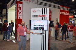 Matt Salvo, vice president of the aftermarket business unit at Global Finishing Solutions, shows on a monitor a sample of the data that can be collected from the company&apos;s Booth Connect, which debuted at the SEMA Show along with the new Edge paint booth.