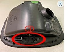 Example of damaged fuel door actuator mount. Example of damaged fuel door actuator mount.