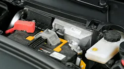 This shows the location of the low-voltage battery system that runs almost all the systems on this Tesla. This shows the older lead-acid AGM battery that is located under all the plastic cowl pieces. If the vehicle has the new lithium-ion low-voltage battery, it is in the same area, but looks more like a module than a battery.