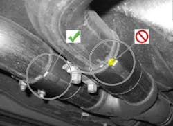 Exhaust clamp locking tabs (at left shows correct position). Exhaust clamp locking tabs (at left shows correct position).