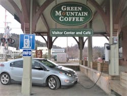 A Chevy Volt recharging at a business location in Vermont. A Chevy Volt recharging at a business location in Vermont.